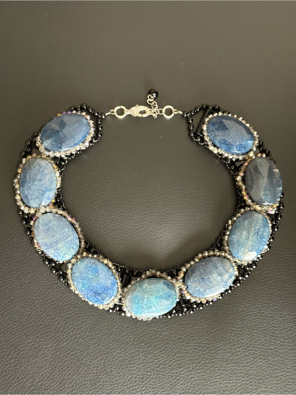 Black statement necklace with natural  stones .